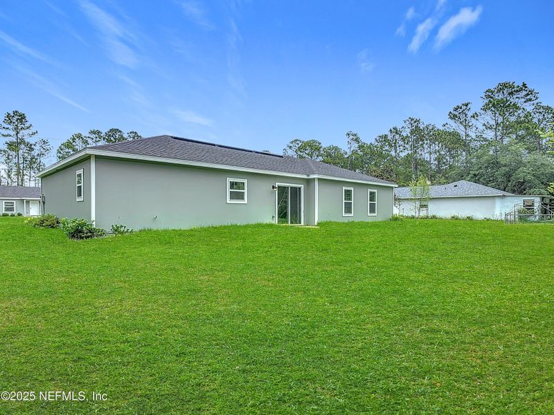 Front exterior of a new home in , Palm Coast, FL, highlighting curb appeal (Image 2). Front exterior of a new home in , Palm Coast, FL, highlighting curb appeal (Image 2).
