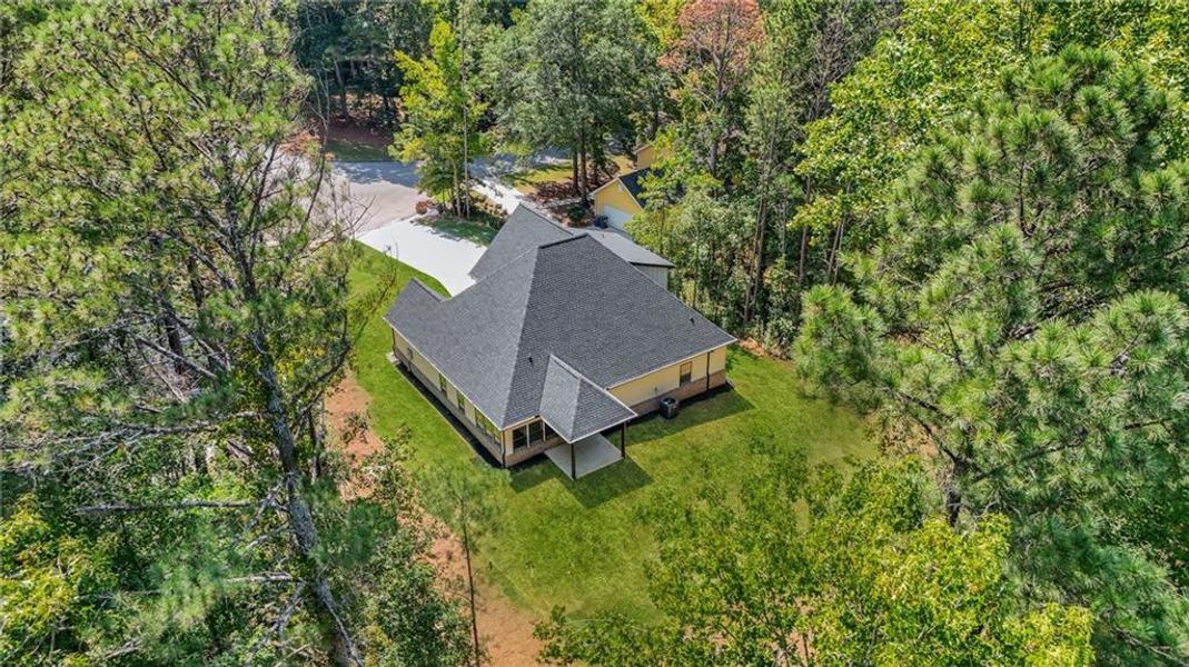 Front exterior of a new home in , Snellville, GA, highlighting curb appeal (Image 25).
