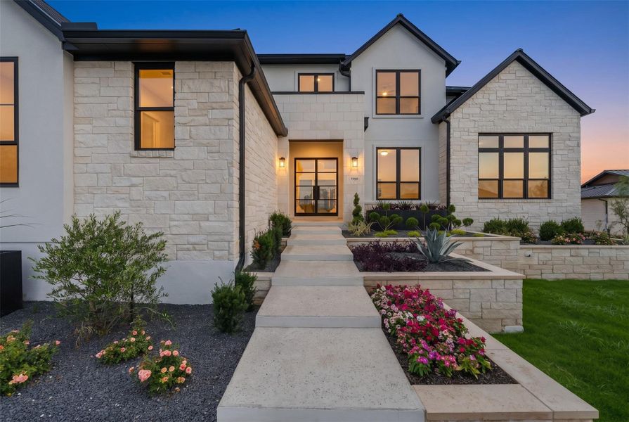 Front exterior of a new home in Sweetwater, Austin, TX, highlighting curb appeal (Image 22).