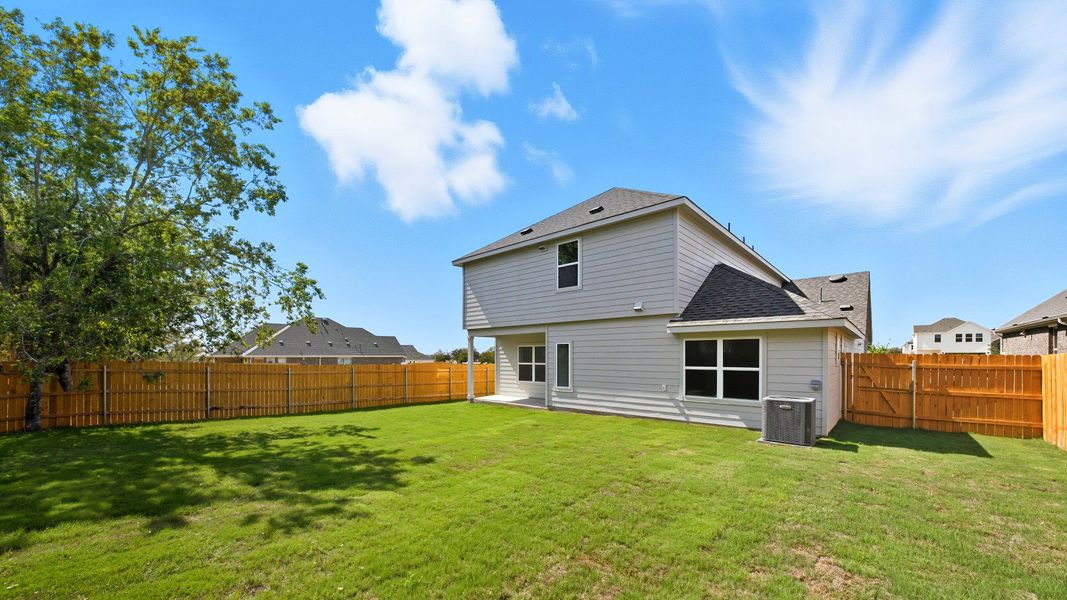 Exterior details and patio area of a home in Creeks Crossing, Elgin (Image 4).