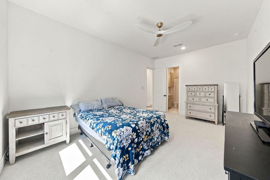 With its own attached bathroom, this secondary bedroom it's a comfortable and flexible space ready for its next owner.