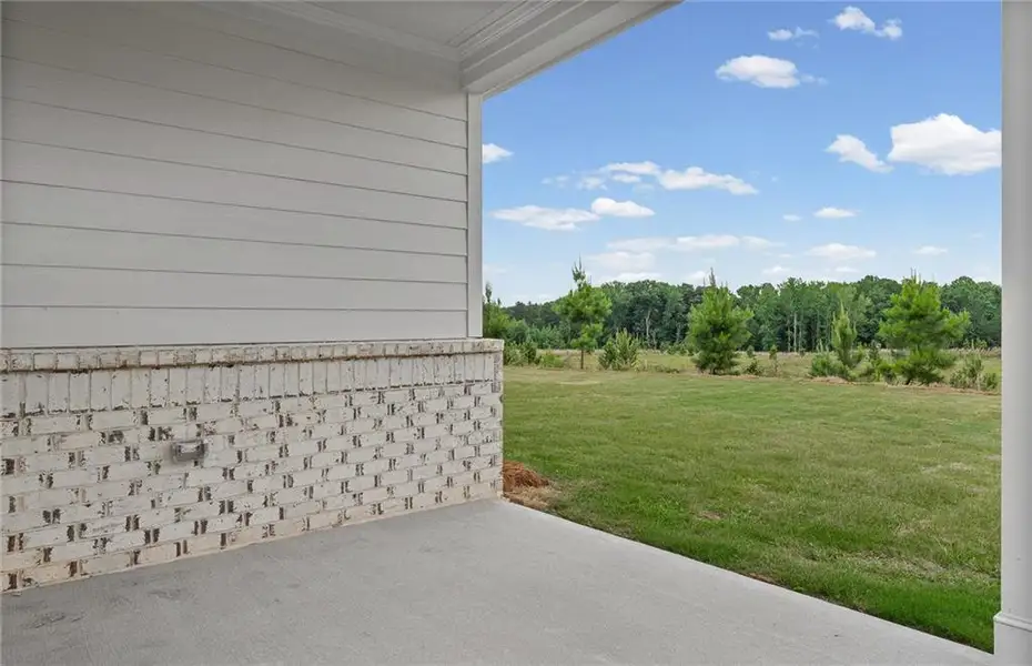 Exterior details and patio area of a home in Overland, Locust Grove (Image 19). Exterior details and patio area of a home in Overland, Locust Grove (Image 19).