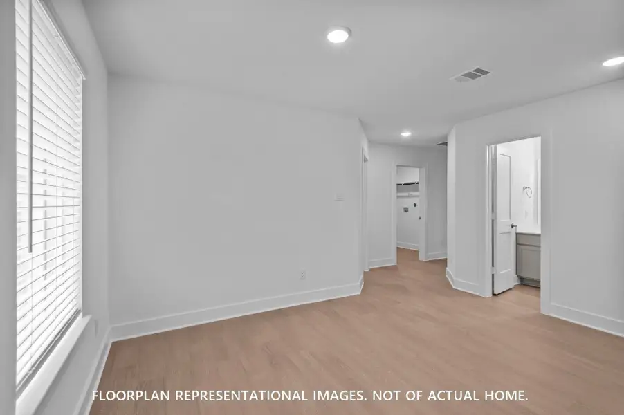 Spacious, unfurnished interior of a new home in Pinewood at Grand Texas, New Caney (Image 24). Spacious, unfurnished interior of a new home in Pinewood at Grand Texas, New Caney (Image 24).