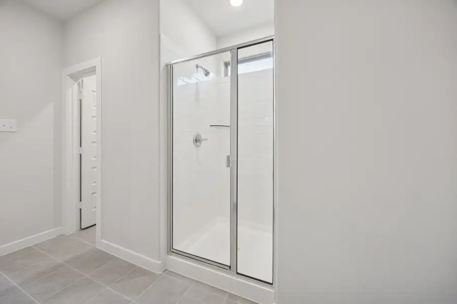 Primary Bathroom in the Oak II home plan by Trophy Signature Homes – REPRESENTATIVE PHOTO Primary Bathroom in the Oak II home plan by Trophy Signature Homes – REPRESENTATIVE PHOTO