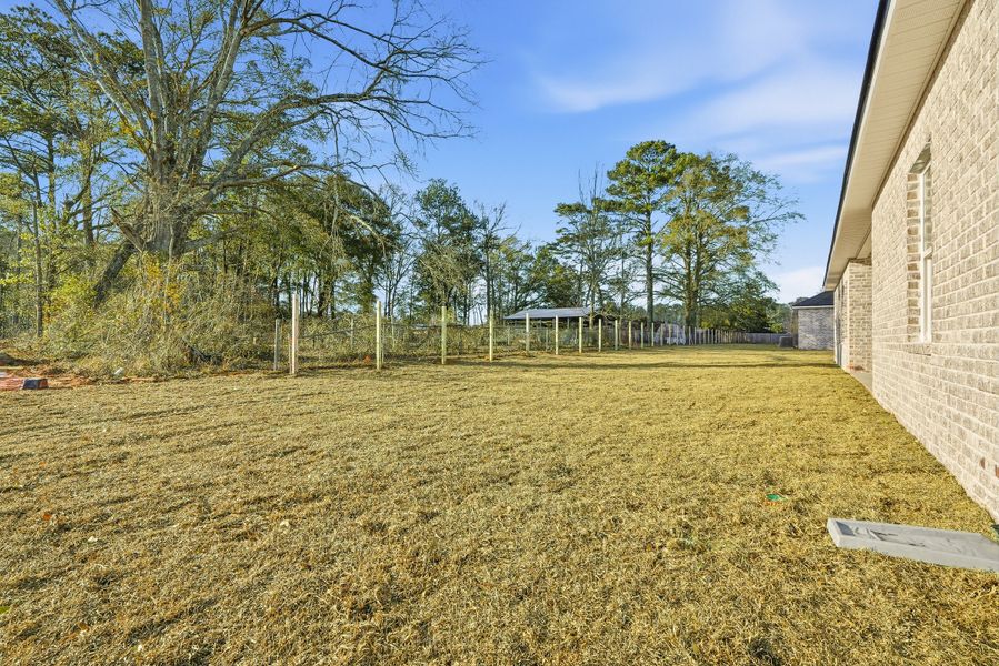 Exterior details and patio area of a home in Barton's Bend, Crestview (Image 27). Exterior details and patio area of a home in Barton's Bend, Crestview (Image 27).
