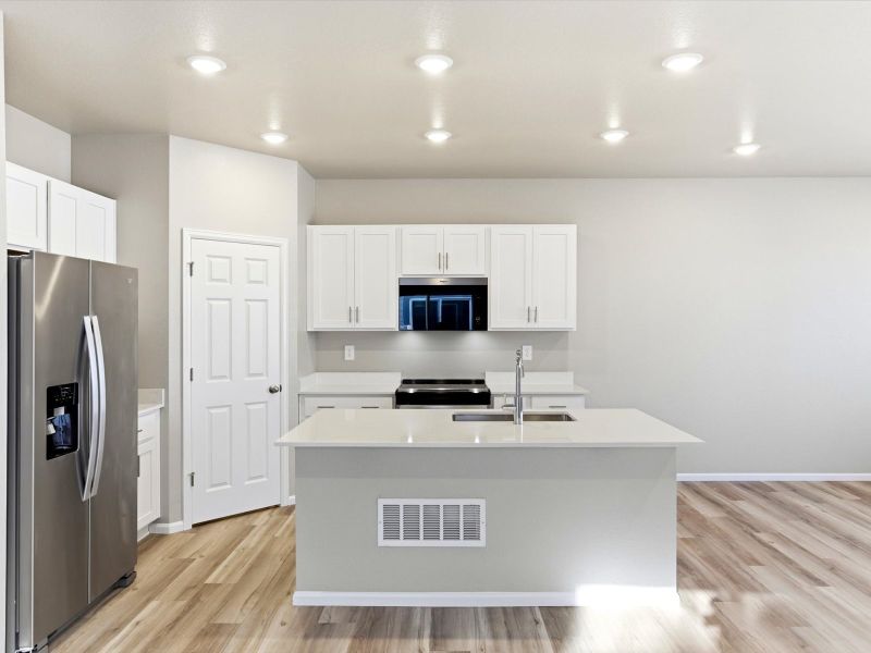 Furnished interior view inside a new home in York Station, Thornton (Image 7).