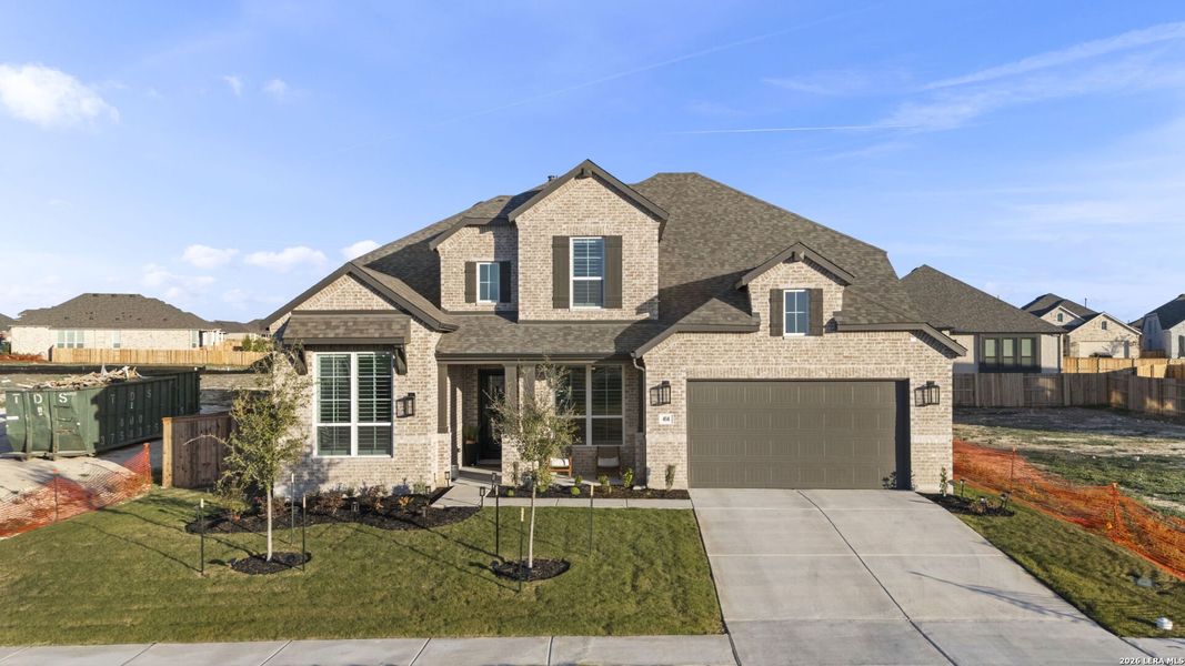 Front exterior of a new home in , Kyle, TX, highlighting curb appeal (Image 25).
