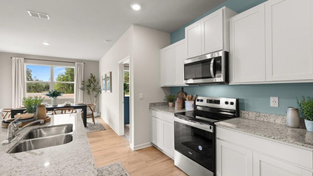 Furnished interior view inside a new home in Oaks at Cedar Grove, Fairburn (Image 18).