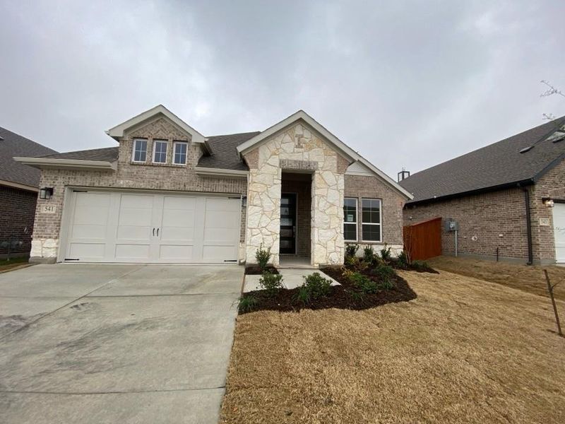 Front exterior of a new home in Morningstar, Aledo, TX, highlighting curb appeal (Image 2).