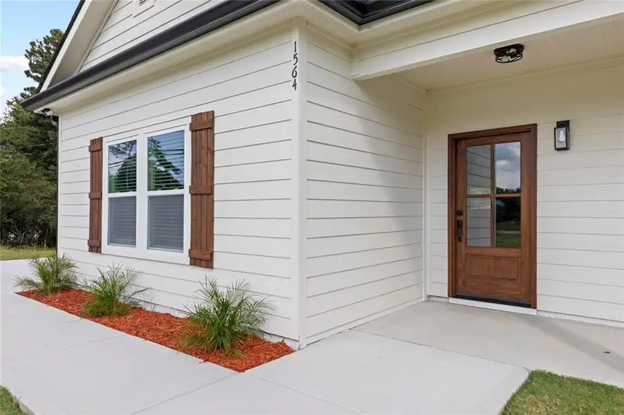 Exterior details and patio area of a home in , Douglasville (Image 4).