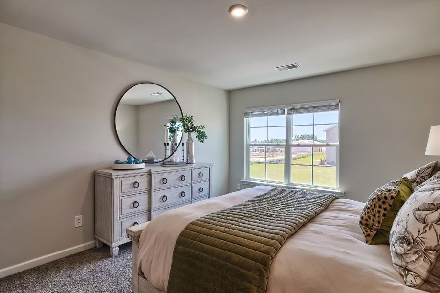 Representative furnished interior of a home built from the Poplar A by McGuinn Homes in Rivers Crossing, Aiken (Image 25).