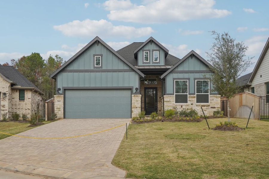 Front exterior of a new home in Kresston, Montgomery, TX, highlighting curb appeal (Image 1). Front exterior of a new home in Kresston, Montgomery, TX, highlighting curb appeal (Image 1).