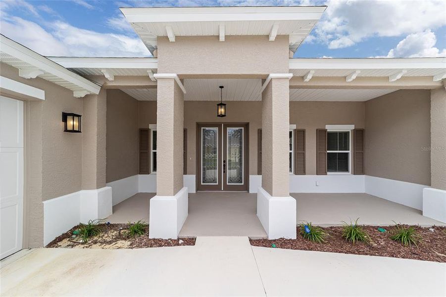 Exterior details and patio area of a home in On Top of the World Communities, Ocala (Image 25).