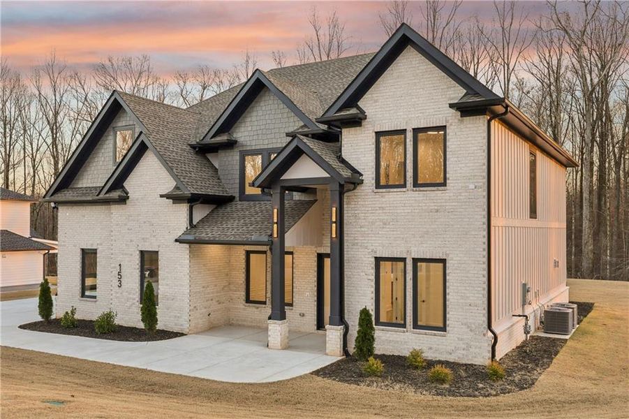 Front exterior of a new home in , Auburn, GA, highlighting curb appeal (Image 31).