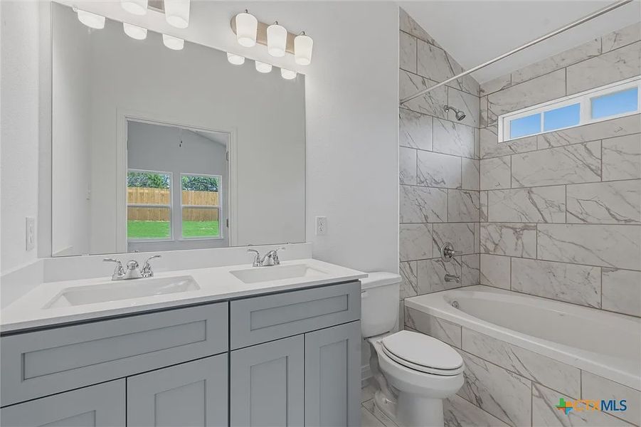 Furnished interior view inside a new home in Turnbo Ranch, Killeen (Image 11).