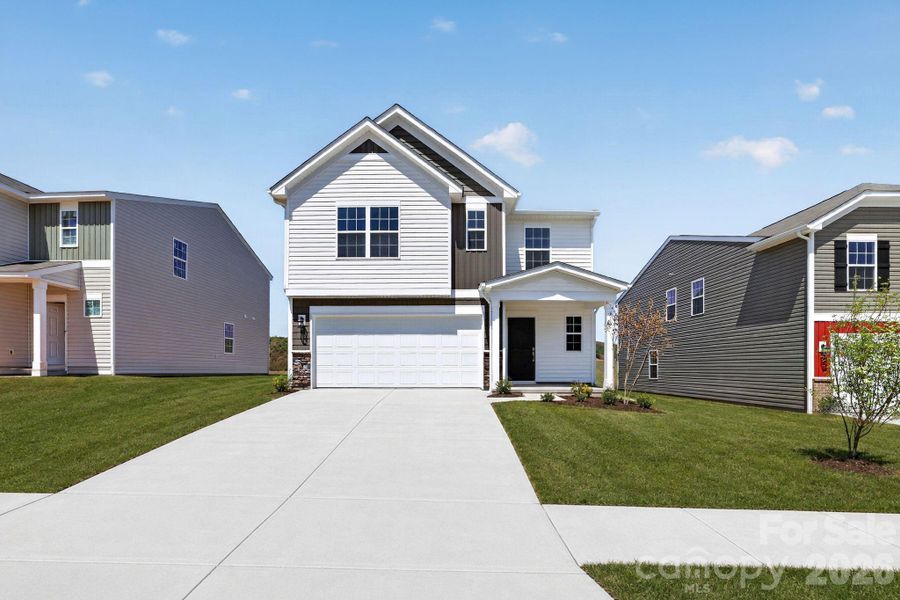 Front exterior of a new home in Cleveland Hill, Shelby, NC, highlighting curb appeal (Image 2). Front exterior of a new home in Cleveland Hill, Shelby, NC, highlighting curb appeal (Image 2).