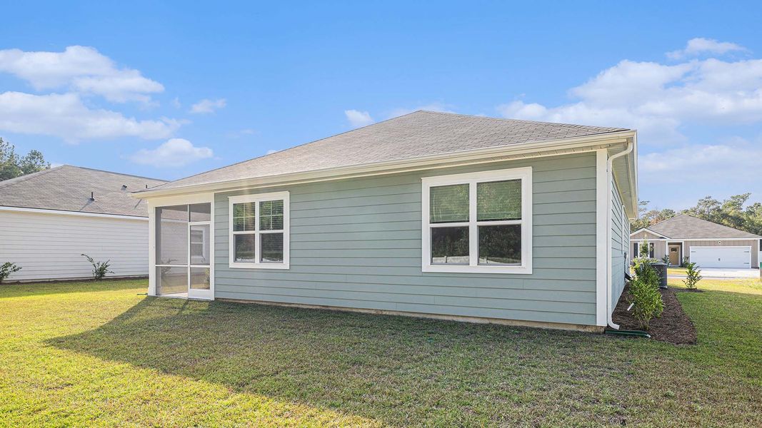 Exterior details and patio area of a home in Auberon Woods, Conway (Image 3).