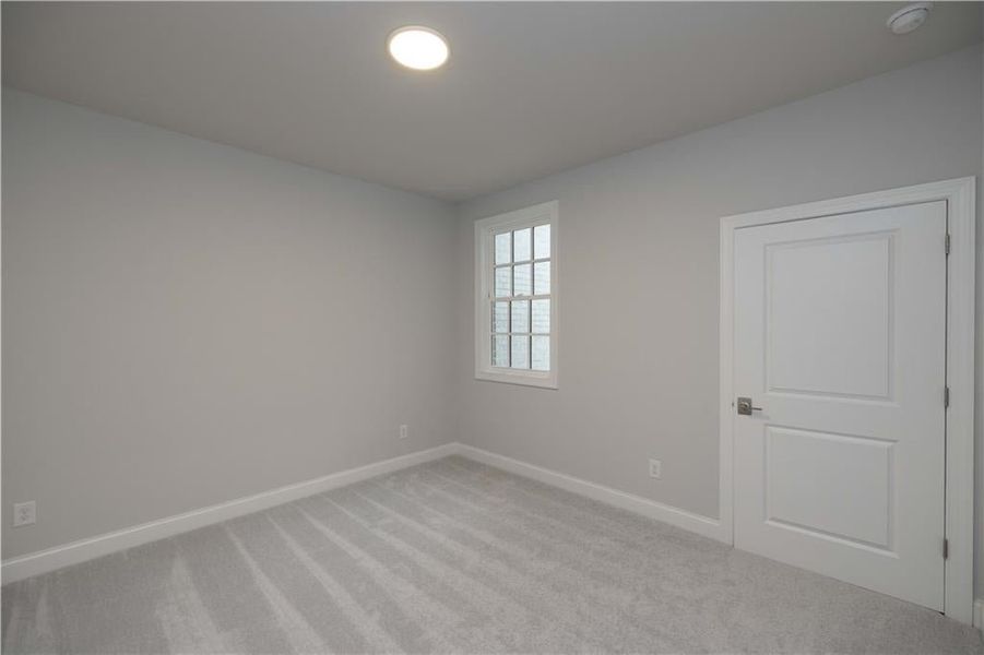 Secondary bedroom also located on the second floor. *Please note photos shown are of the Ellington plan but not of the actual home.