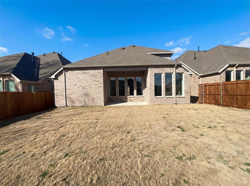 Exterior details and patio area of a home in Shaded Tree, McKinney (Image 3).