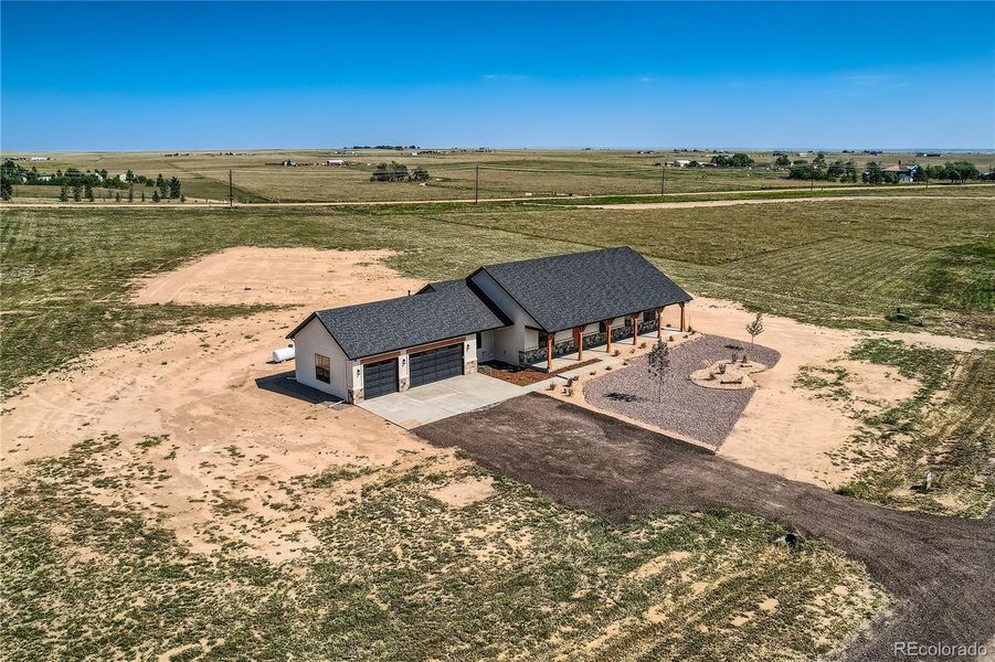 3 Car Garage and big Front Porch.