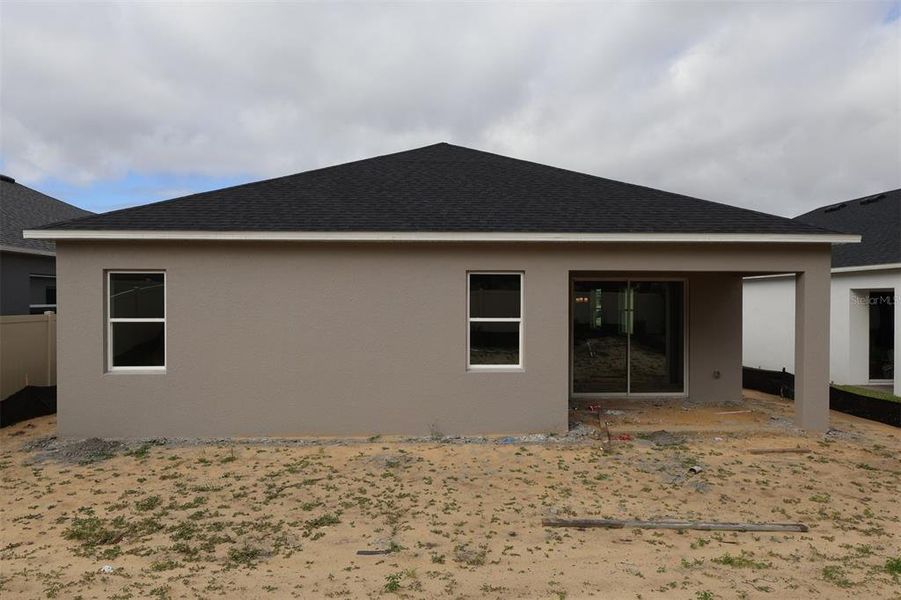 Exterior details and patio area of a home in Emerson Pointe, Apopka (Image 15).