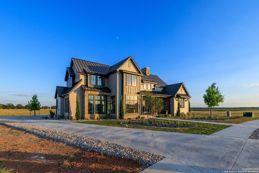 Front exterior of a new home in , Fredericksburg, TX, highlighting curb appeal (Image 27). Front exterior of a new home in , Fredericksburg, TX, highlighting curb appeal (Image 27).