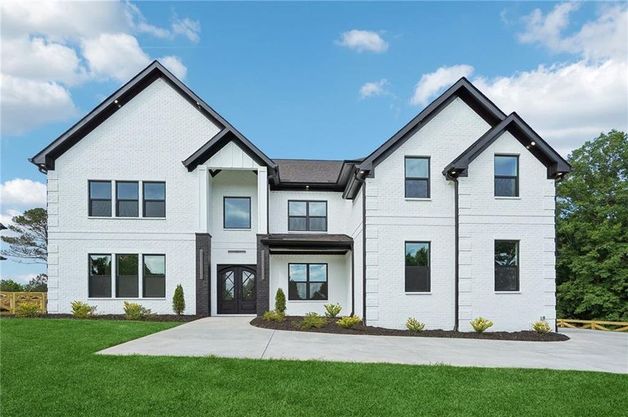 Front exterior of a new home in , Braselton, GA, highlighting curb appeal (Image 1). Front exterior of a new home in , Braselton, GA, highlighting curb appeal (Image 1).