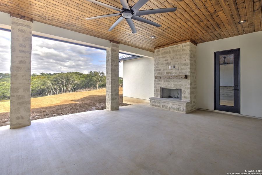 Exterior details and patio area of a home in , New Braunfels (Image 24).