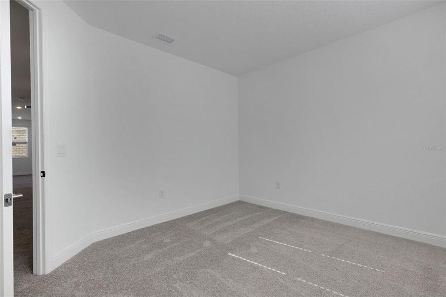 Spacious, unfurnished interior of a new home in Hawkstone, Sarasota (Image 52).