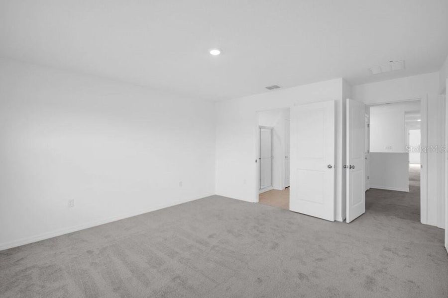 Spacious, unfurnished interior of a new home in Waterstone, Groveland (Image 36). Spacious, unfurnished interior of a new home in Waterstone, Groveland (Image 36).