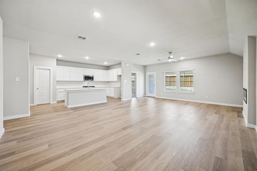 First Floor in the Oscar home plan by Trophy Signature Homes – REPRESENTATIVE PHOTO First Floor in the Oscar home plan by Trophy Signature Homes – REPRESENTATIVE PHOTO