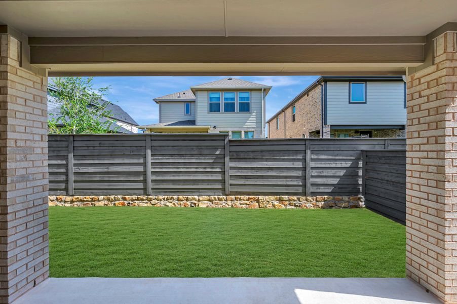 Exterior details and patio area of a home in Union Park, Little Elm (Image 17). Exterior details and patio area of a home in Union Park, Little Elm (Image 17).
