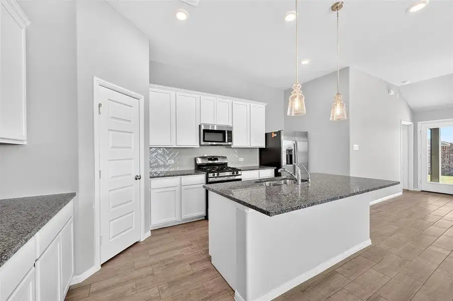 Furnished interior view inside a new home in Mobberly Farms, Pilot Point (Image 10). Furnished interior view inside a new home in Mobberly Farms, Pilot Point (Image 10).
