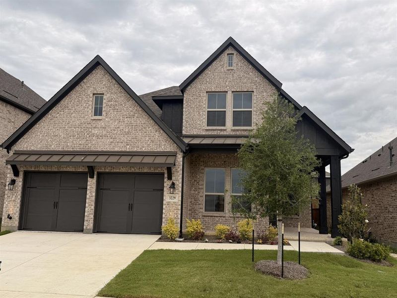 Front exterior of a new home in Brookshire at Legacy Hills, Celina, TX, highlighting curb appeal (Image 2).