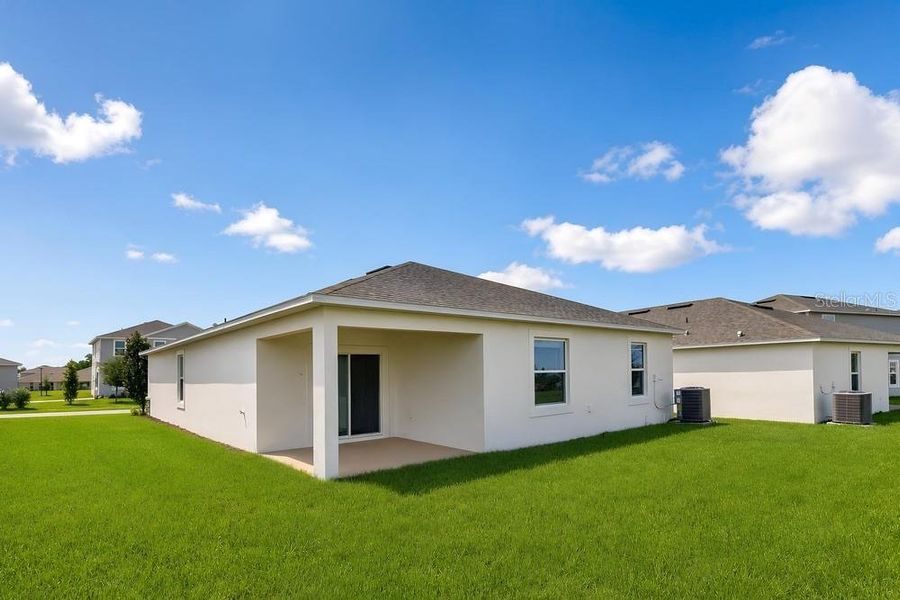 Exterior details and patio area of a home in Waterstone, Groveland (Image 14).
