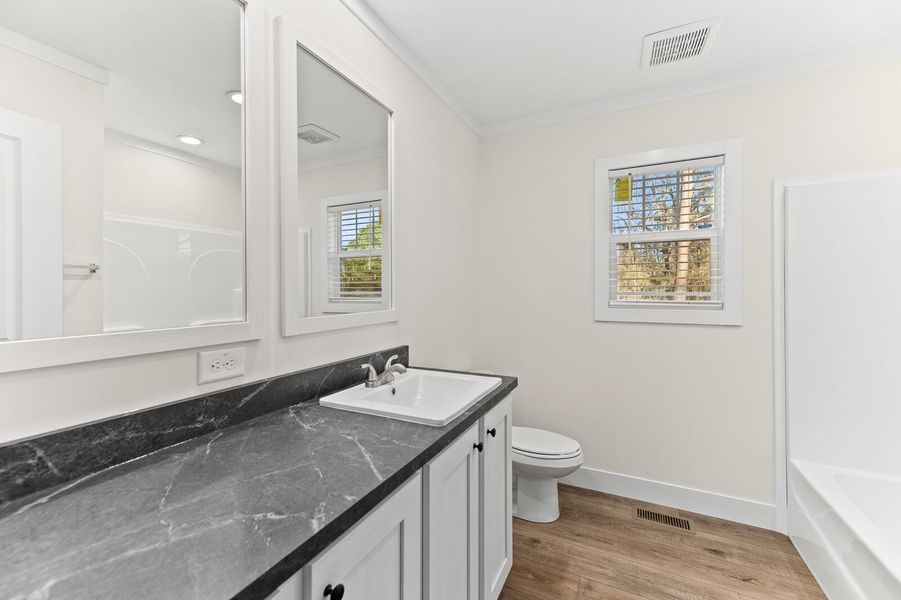 Furnished interior view inside a new home in , Pineville (Image 7).