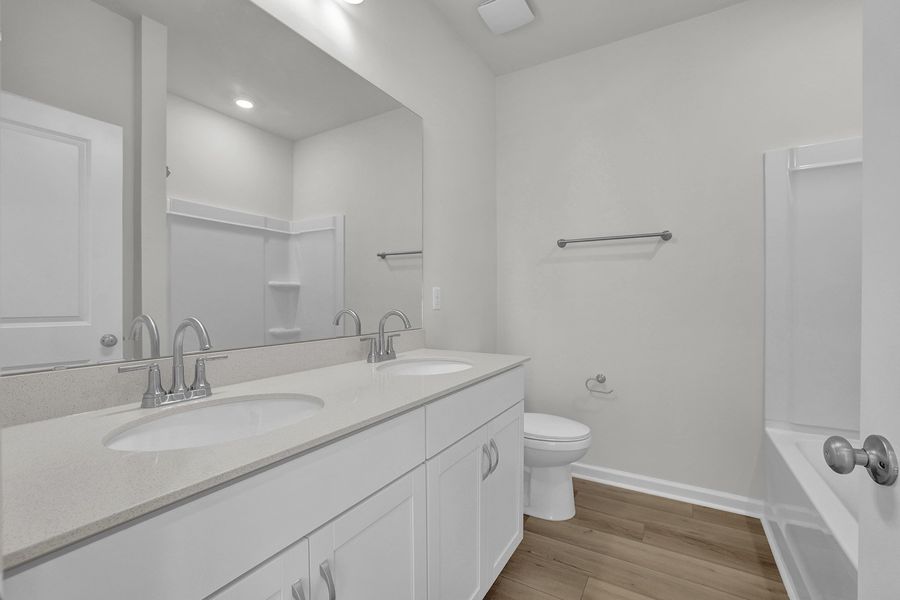 Furnished interior view inside a new home in Grand Park, Leland (Image 10).