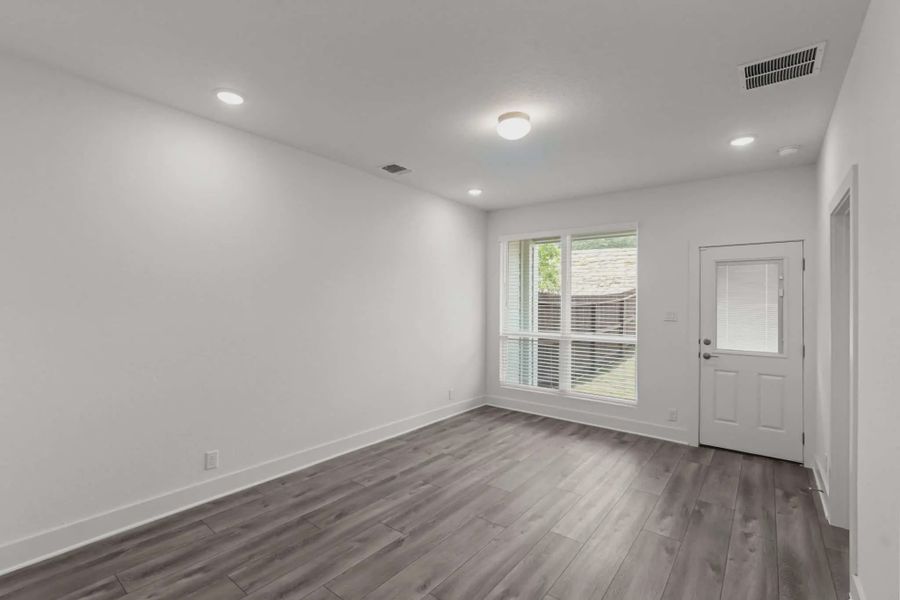 Representative unfurnished interior of a home built from the Athena by Chesmar Homes in Prominence Urban, San Antonio (Image 10).