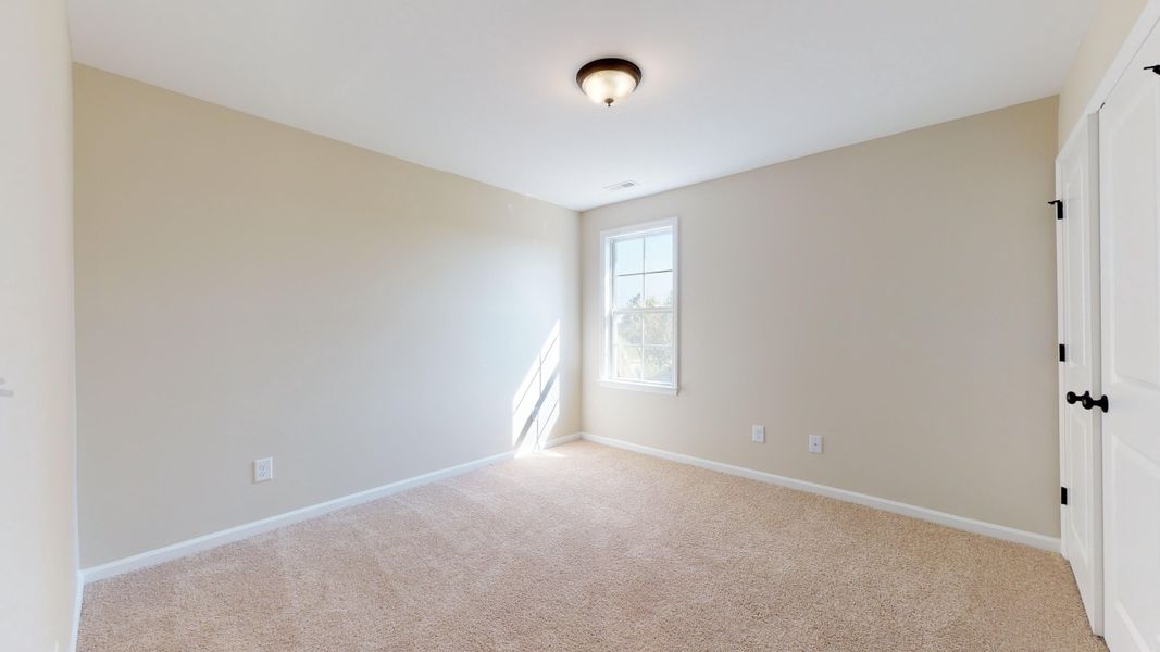 Representative unfurnished interior of a home built from the Rockbridge by Bill Clark Homes in Davenport Farms, Winterville (Image 45).