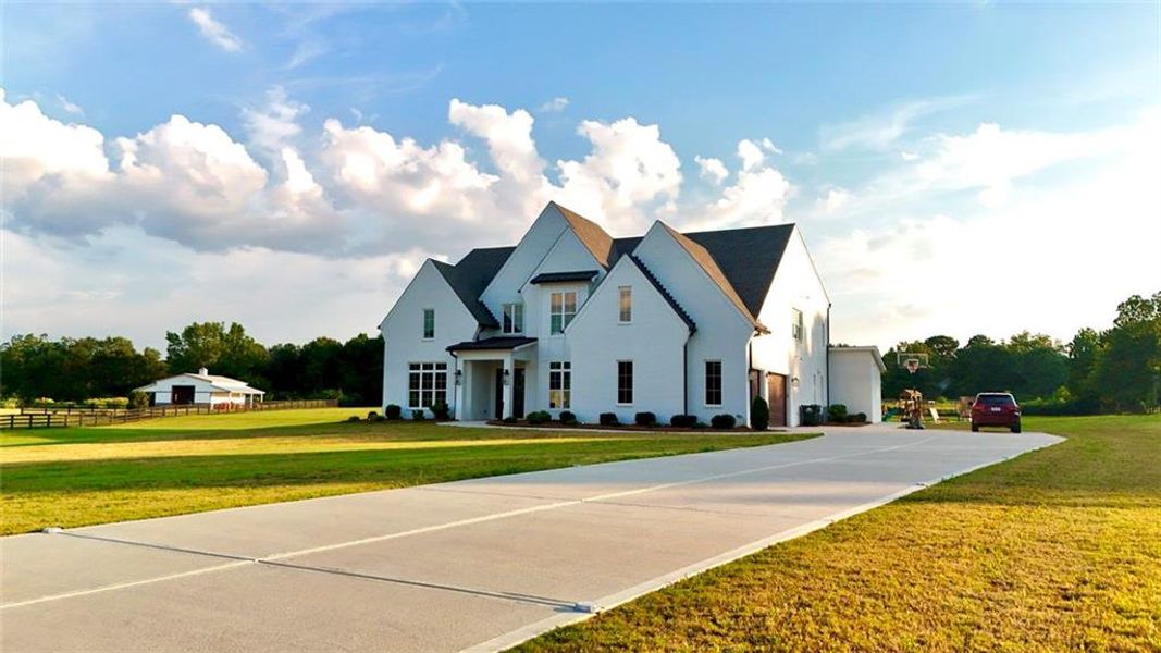 Front exterior of a new home in , Bishop, GA, highlighting curb appeal (Image 30). Front exterior of a new home in , Bishop, GA, highlighting curb appeal (Image 30).