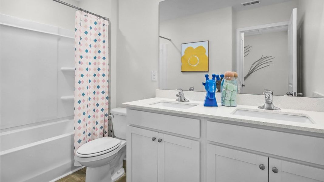 Representative furnished interior of a home built from the BELHAVEN by D.R. Horton in Lawson Glen, Clayton (Image 30).