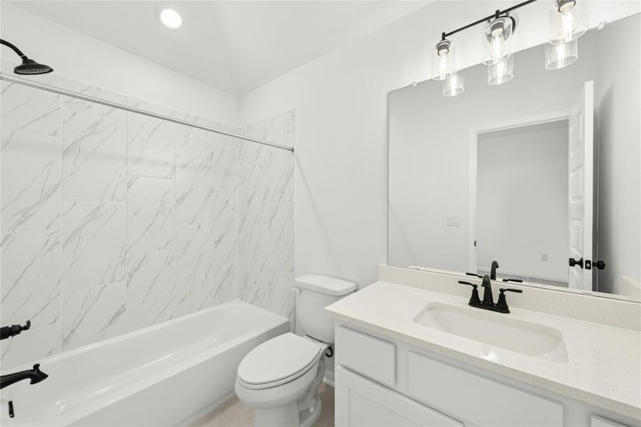 Bathroom with tub / shower combination and vanity Bathroom with tub / shower combination and vanity