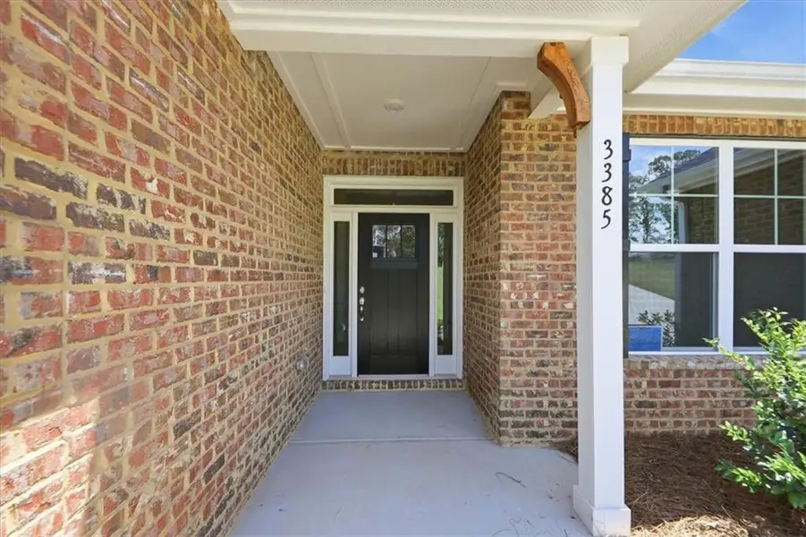 Exterior details and patio area of a home in Tuscany Hills, Douglasville (Image 4).