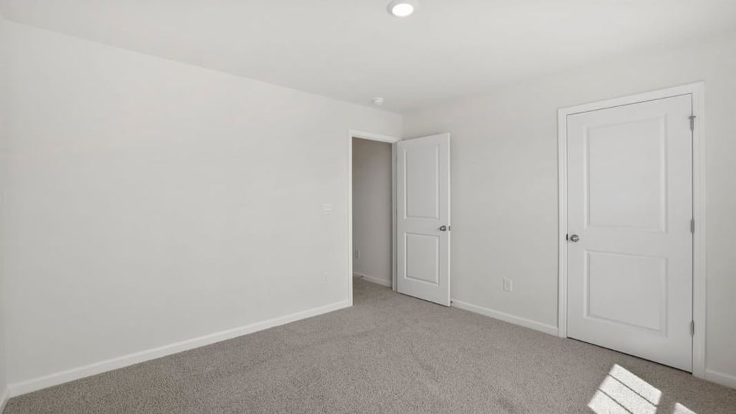 Spacious, unfurnished interior of a new home in Durbin Meadows Traditions, Fountain Inn (Image 27).