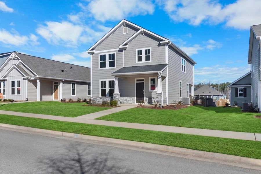 Front exterior of a new home in Tillery Park, Grovetown, GA, highlighting curb appeal (Image 21). Front exterior of a new home in Tillery Park, Grovetown, GA, highlighting curb appeal (Image 21).