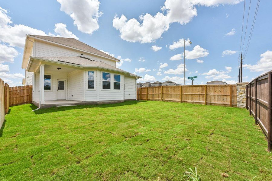 Exterior details and patio area of a home in Edgebrooke, Pflugerville (Image 3).