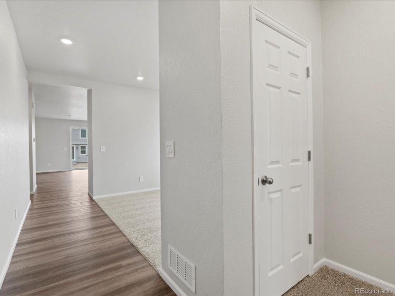 Spacious, unfurnished interior of a new home in Ridgeline Vista: The Flora Collection, Brighton (Image 24). Spacious, unfurnished interior of a new home in Ridgeline Vista: The Flora Collection, Brighton (Image 24).