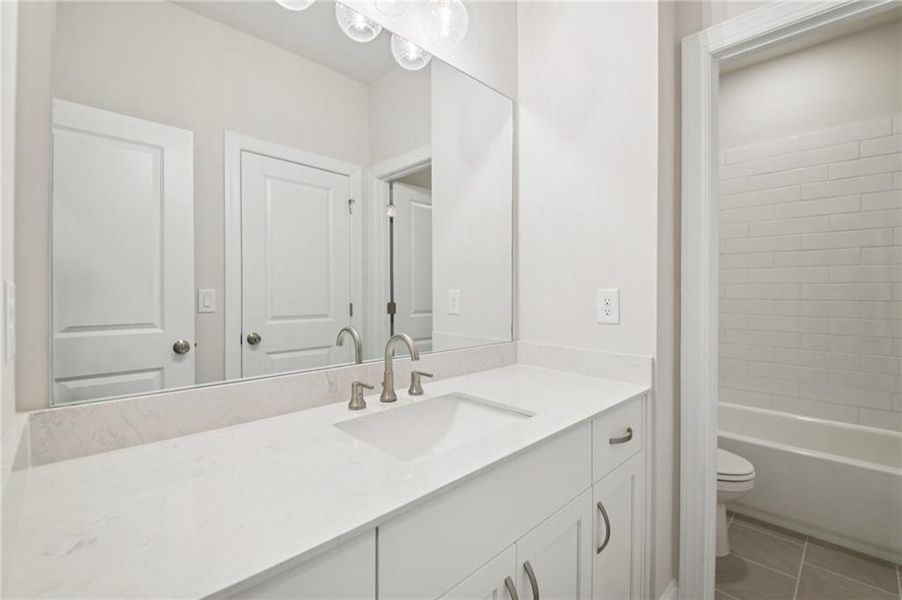 Furnished interior view inside a new home in Ward's Crossing Townhomes, Johns Creek (Image 5).