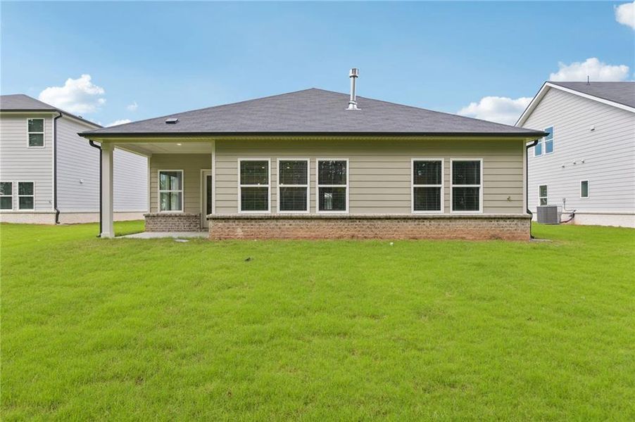 Exterior details and patio area of a home in Parkside at Grayson, Grayson (Image 4).