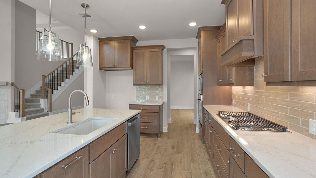 Furnished interior view inside a new home in Bridgeland, Cypress (Image 9).